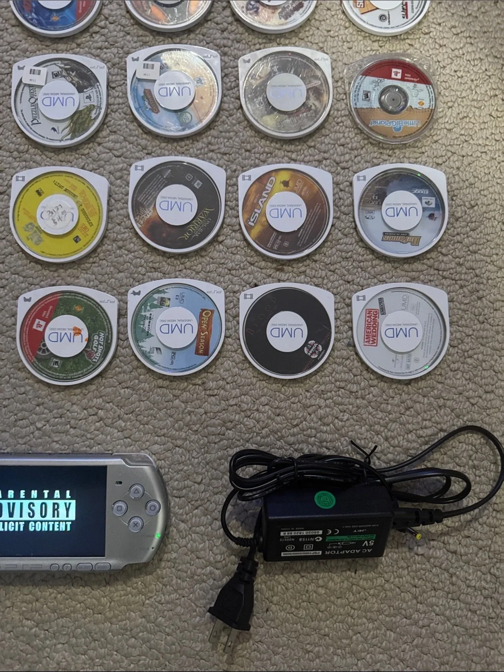 Sony Silver PSP-3001 Portable Gaming System with Multiple UMD Games